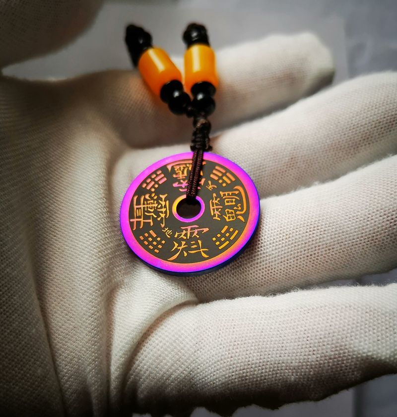 Titanium alloy charm coin with the inscription of Ziwei Hui