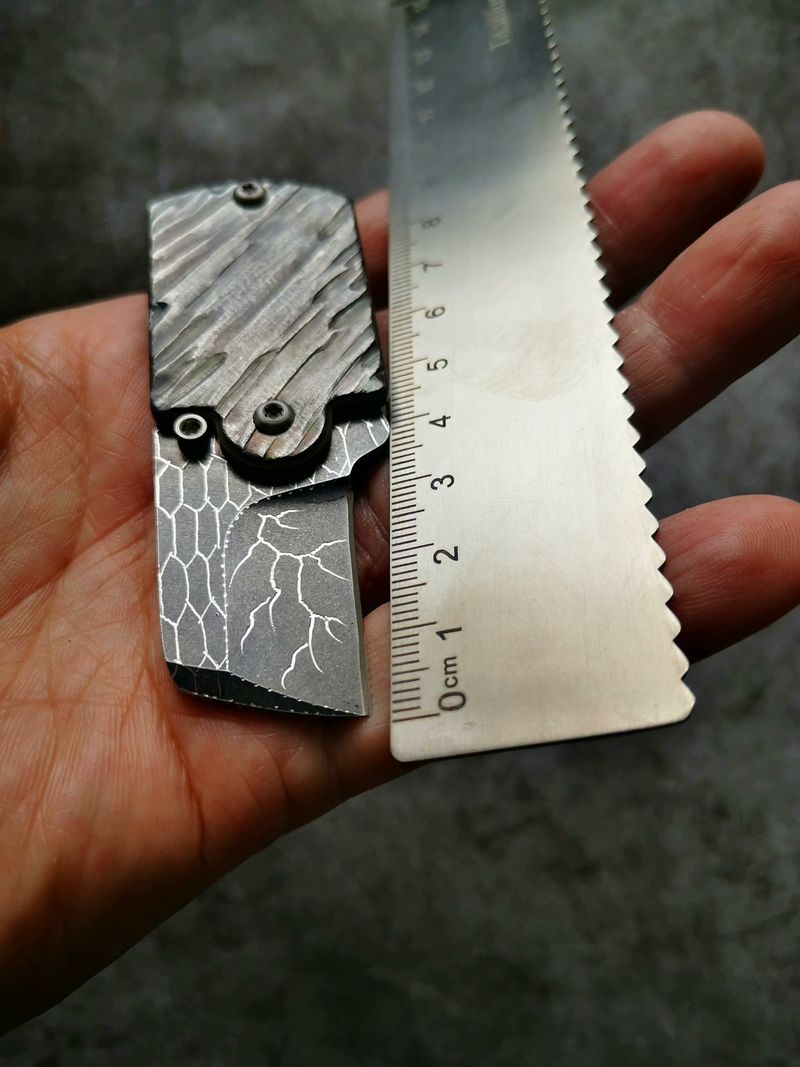 Shale - textured alloy coin knife